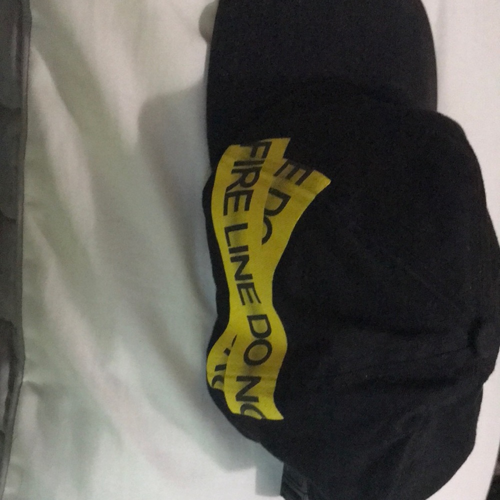 Off-White “fire line do not cross” caution tape hat